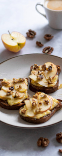 coffe and sliced apple, syrup and peacan nuts on toast
